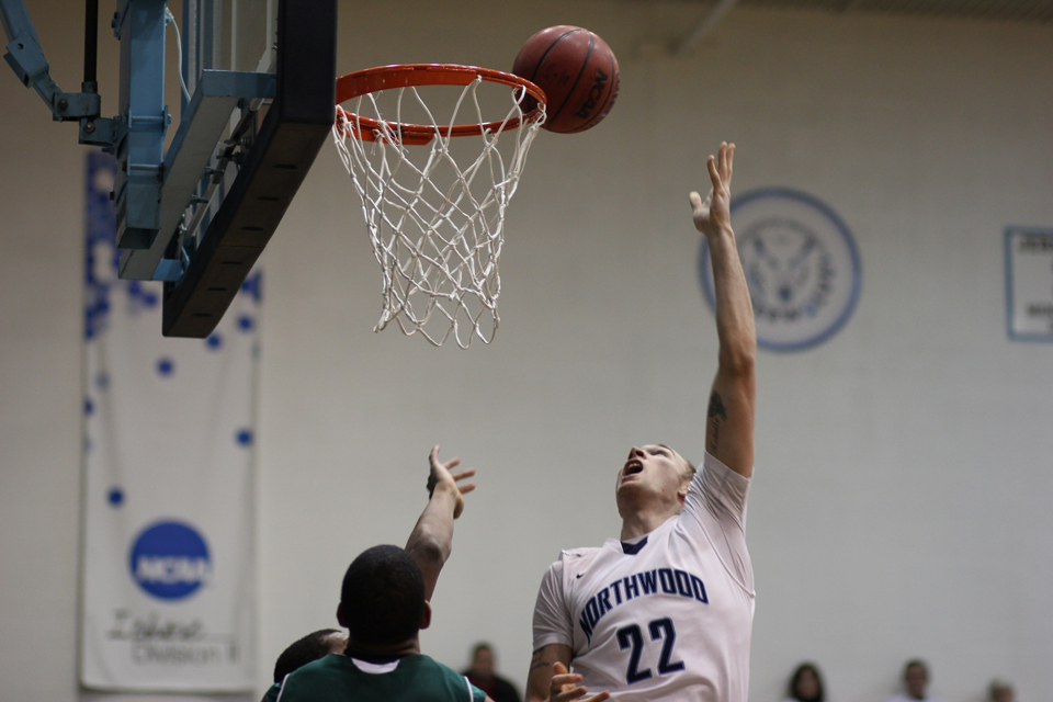 Men's Basketball Defeats Wayne State 77-64