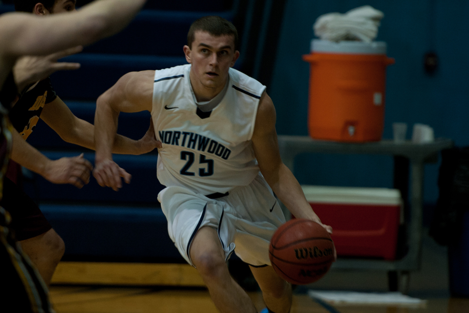Men's Basketball Loses At Malone 84-77