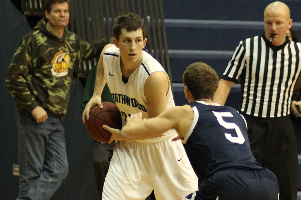 Men's Basketball Defeats Malone 62-56